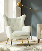 Fauteuil Isabelle Wingback en velours avec confort rembourré et pieds en métal doré élégants