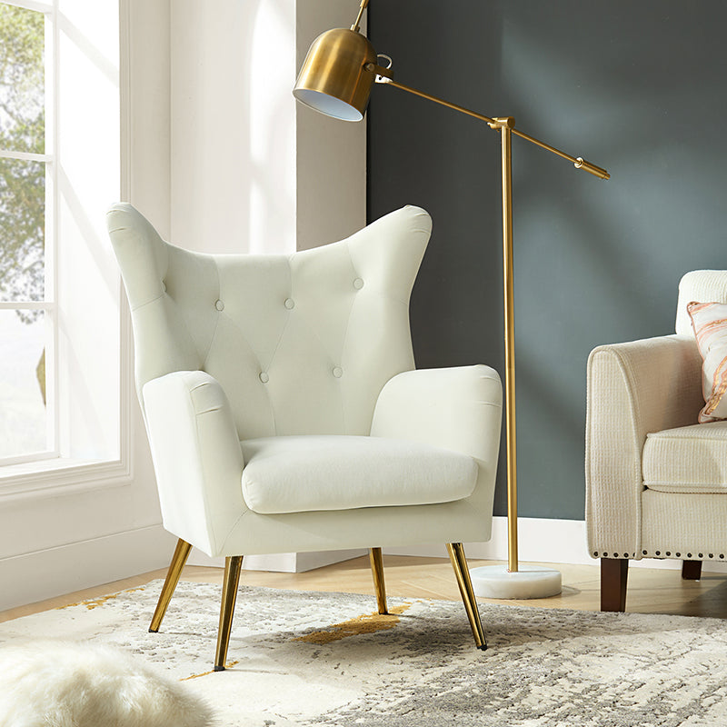 Fauteuil Isabelle Wingback en velours avec confort rembourré et pieds en métal doré élégants