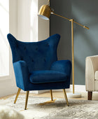 Fauteuil Isabelle Wingback en velours avec confort rembourré et pieds en métal doré élégants